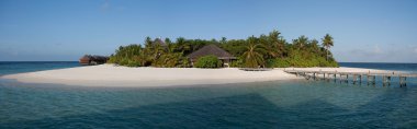 Panorama of a small tropical island, Maldives clipart