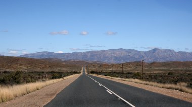 Road through the desert clipart