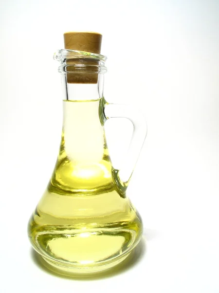Oil in decanter on white — Stock Photo, Image