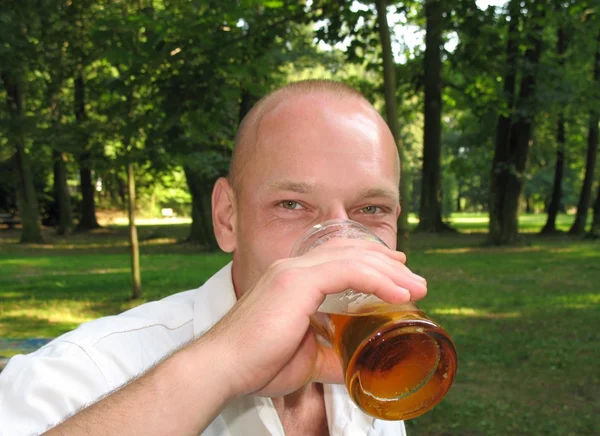 stock image Young drinking beer