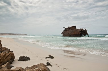 Shipwreck on the coast of Boa Vista in Cape Verde clipart