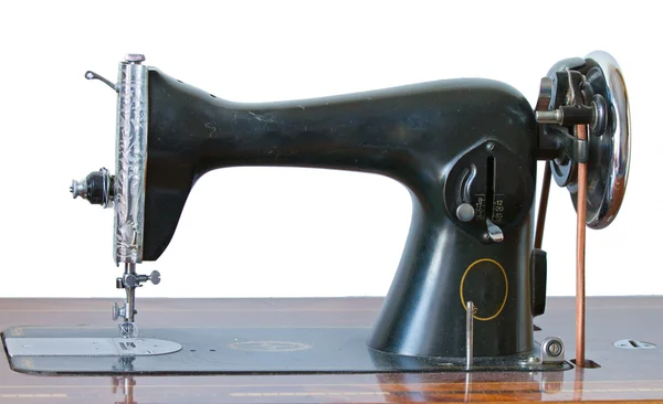 Antique sewing machine on white — Stock Photo, Image