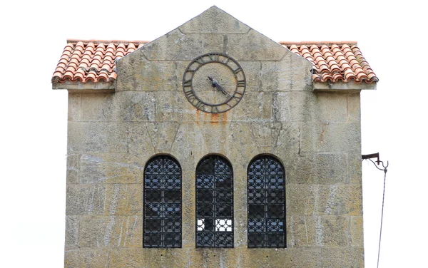Klocka på toppen av byggnaden — Stockfoto