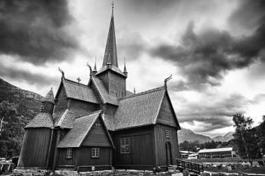 Norwegian Church on a stormy day. Black and White clipart