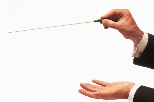 stock image Conductor conducting an orchestra