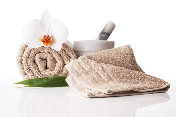 Spa treatment towel orchid pestle and mortar — Stock Photo, Image