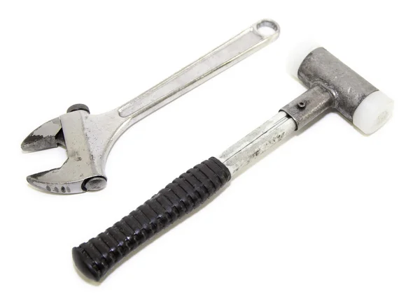Hulpmiddelen moersleutel en hammer — Stockfoto