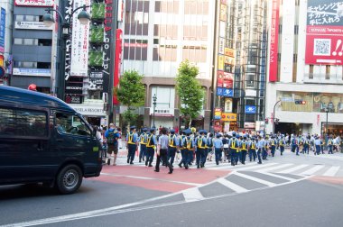 Japanese police in Tokyo clipart