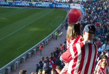 Atletico de Madrid fans at the Vicente Calderon, Madrid, Spain clipart