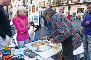 Painter working on Piazza Navona, Rome clipart