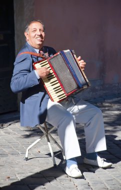 Man playing the accordion clipart