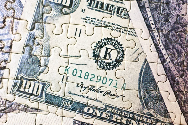 Puzzle de dinero — Foto de Stock