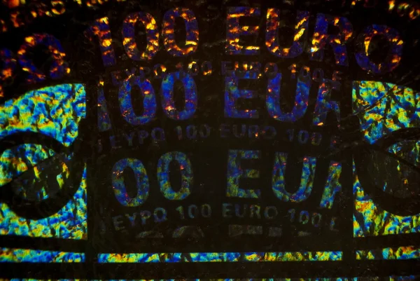 MicroPhoto euro hologramem — Zdjęcie stockowe