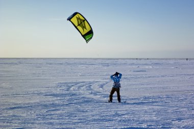 Kite surfer in the snow clipart