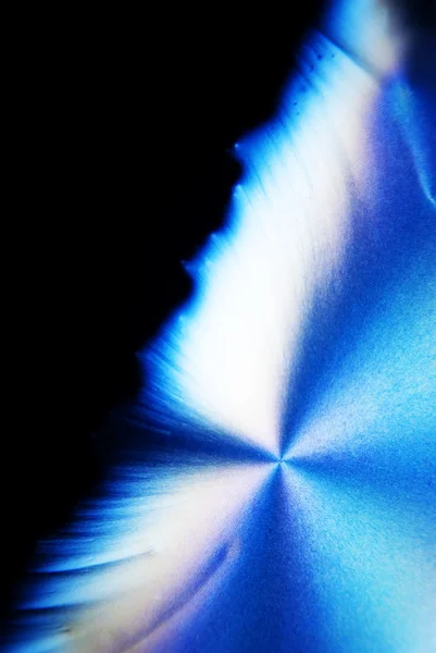 Мікрокристали аскорбінової кислоти в поляризованому світлі — стокове фото