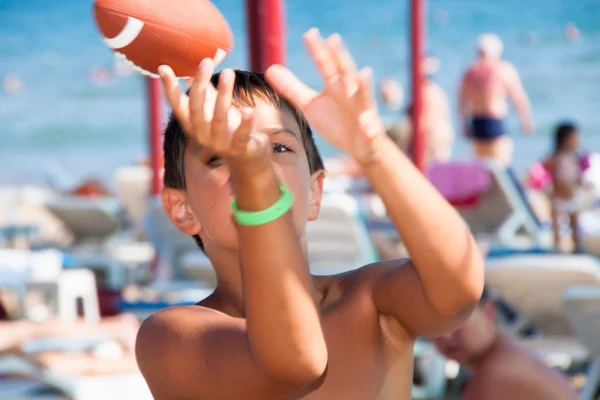 stock image The boy plays with a ball