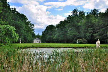 Lake of Schloss Fasanarie park in Fulda, Hessen, Germany clipart