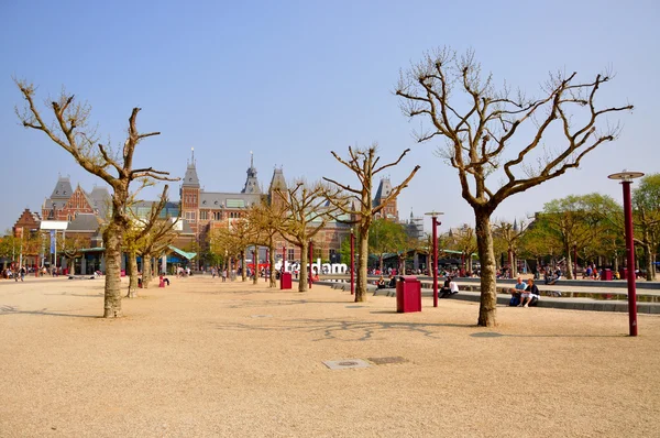 Rijksmuseum naked bald trees and yellow sand in Amsterdam, Holla — Stock Photo, Image