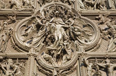 Milan - detail from main bronze gate - Pieta clipart