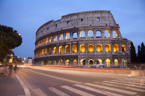 stock image Rome - colosseum in evening and the road