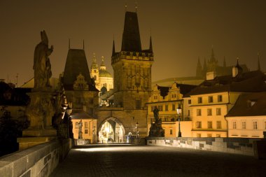 Prague - outlook from Charles bridge at night clipart