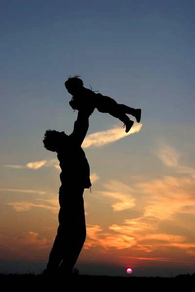 Mother and daughter - love in sunset — Stock Photo, Image