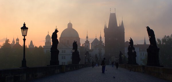 Prague - Charles bridge in morning fog - sunrise