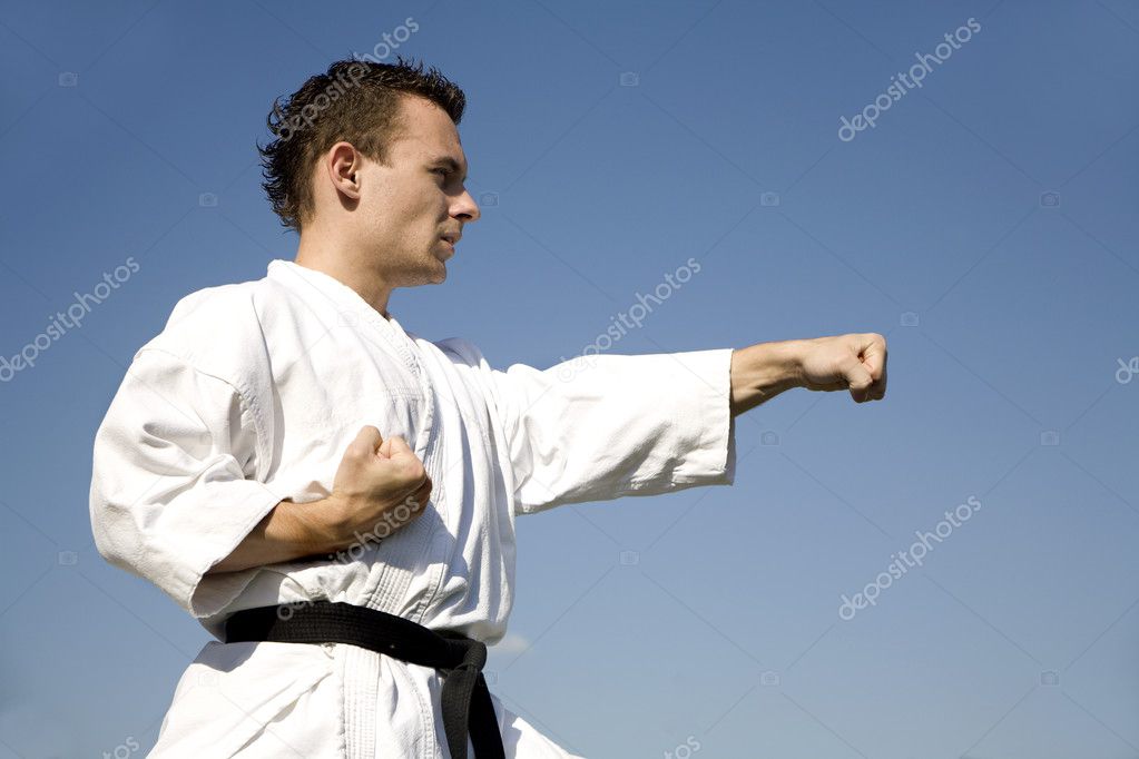 Karate training in kimono - kata