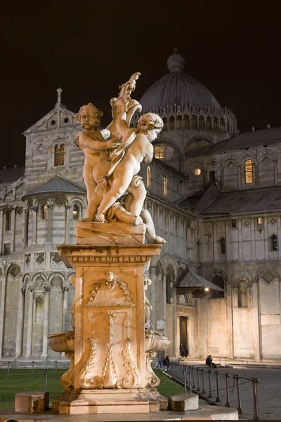 Pisa - statue of angles and cathedral in the night - piazza dei miracoli Stock Photo
