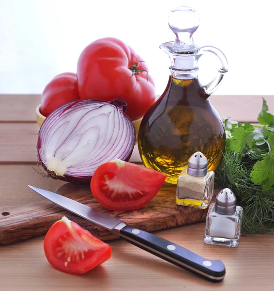 Olive oil, tomatoes, onion and herbs — Stock Photo, Image