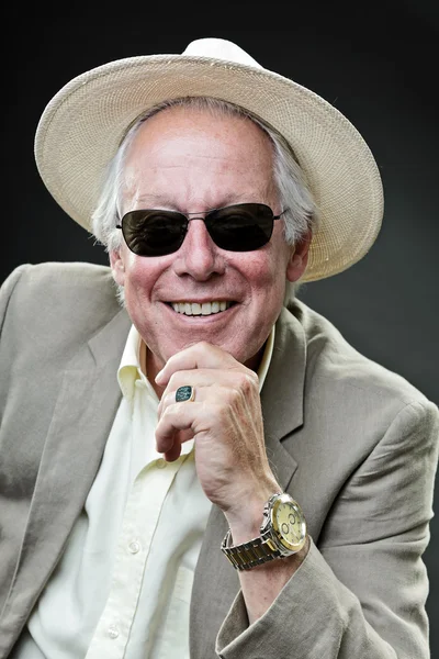 Senior gangster man wearing light suit and hat with black sunglasses. — Stock Photo, Image
