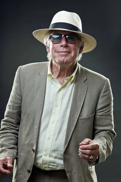Senior man in suit wearing hat and vintage sunglasses. — Stock Photo, Image