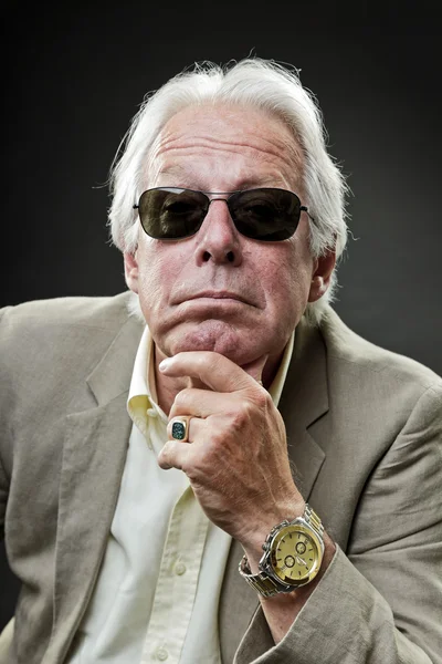 Senior business man wearing suit and black sunglasses. — Stock Photo, Image