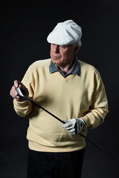stock image Studio portrait of senior golf man.