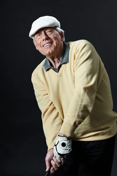 Studio portret van senior golf man. — Stockfoto