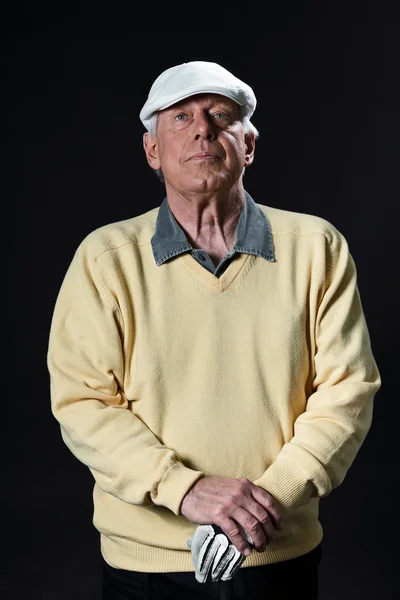Studioporträt des Senior Golf-Mannes. — Stockfoto