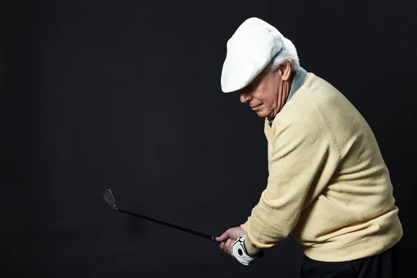 Studio porträtt av senior golf man. — Stockfoto