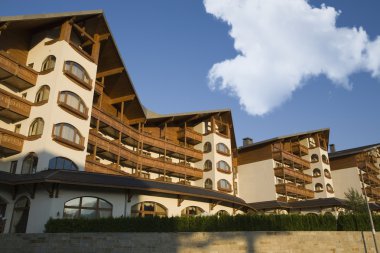 Bansko architecture contemporary Kempinski hotel, Pirin mountain Balkans Bulgaria clipart