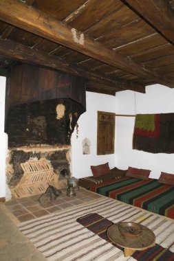 Bansko, famous ski resort in Bulgaria, typical interior in old bulgarian house clipart