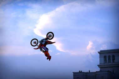 FMX rider performing a stunt clipart
