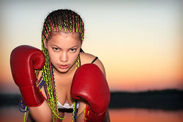 Portrait of a girl with red boxing gloves — Stock Photo, Image