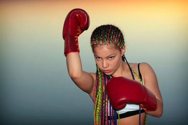 Portrait of a girl with red boxing gloves — Stock Photo, Image