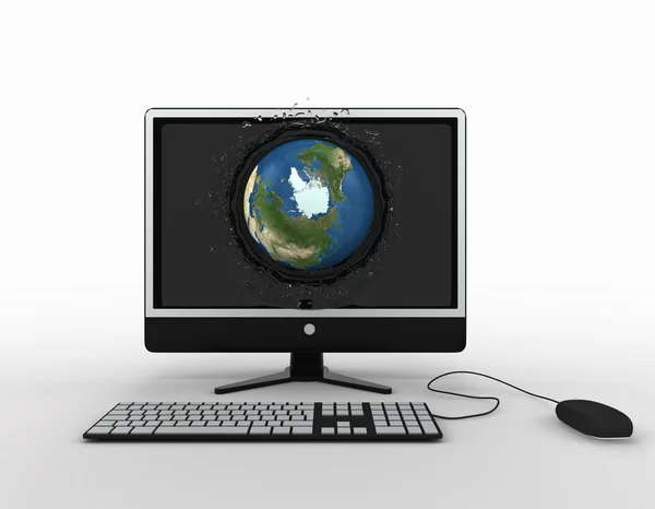 Globe falling with splashes into the computer monitor screen — Stock Photo, Image