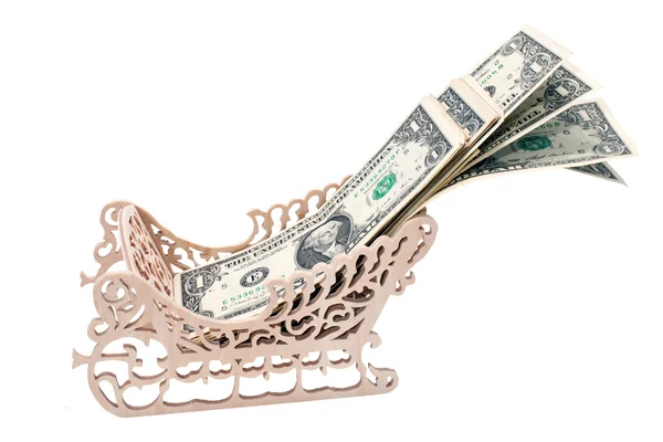 Banknotes in a wooden sled. — Stock Photo, Image