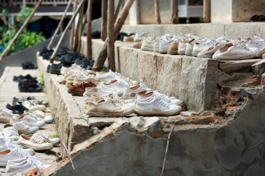 Many shoes on stairs clipart