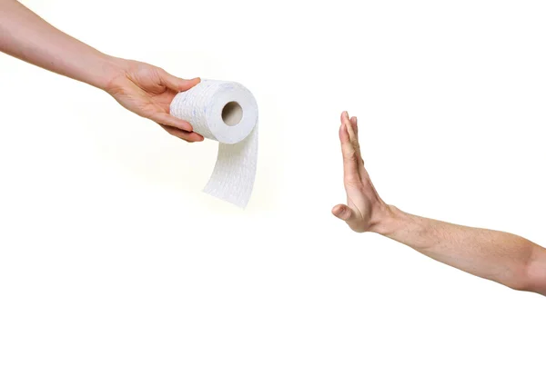 Mão rejeitando papel higiênico — Fotografia de Stock