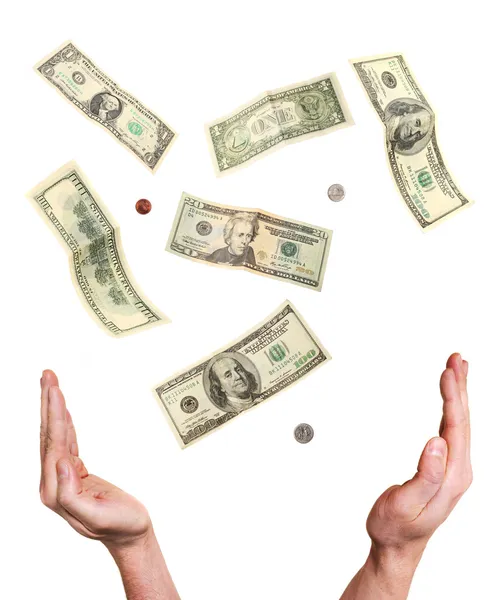 Lucky hands reaching out for falling money — Stock Photo, Image