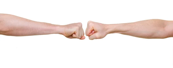在白色背景上孤立的对抗中的两个拳头 — 图库照片