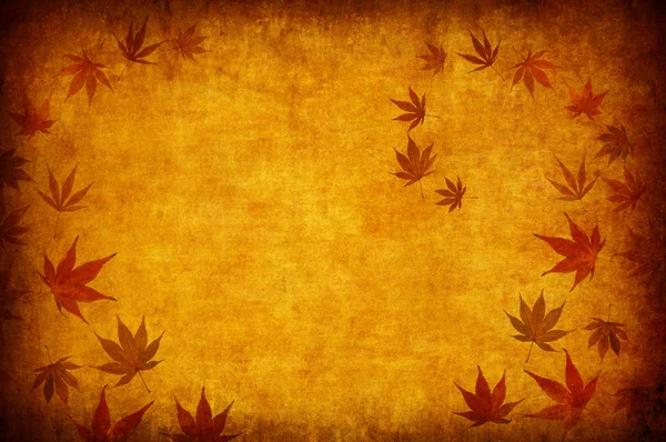 Abstracte grunge herfst achtergrond met bladeren Stockfoto