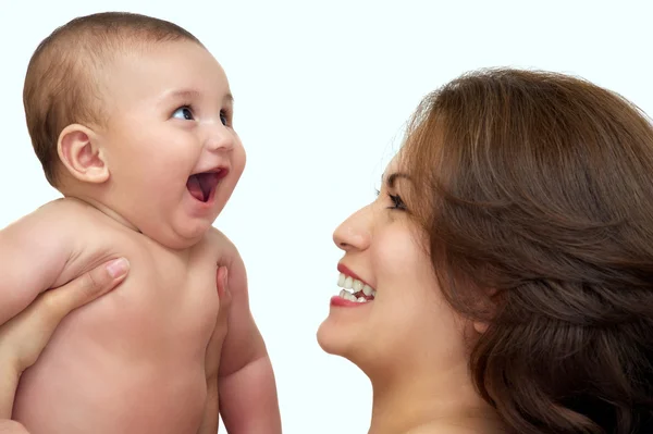 Portret van een jonge moeder met hier baby — Stockfoto